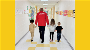 Guard walking children